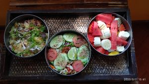 Aloo Tok (Burmese potato dish), Myanmar Salad (tea leaf salad) and fruit salad. at Two Sisters in Pai