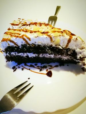 Delicious chocolate cake with coconut cream. at Loving Hut in Hannover