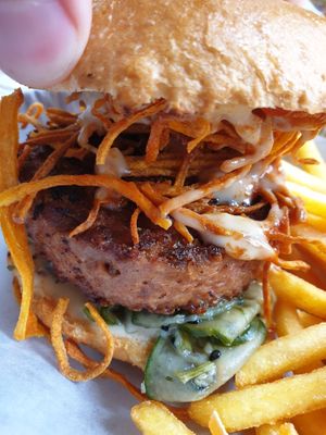 Burger with fried onion and pickled cucumber Etc. at Burgersson in Gothenburg