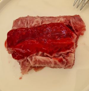 The sweet vegan one, with raspberry at Moji Struklji - My Dumplings of Slovenia in Ljubljana