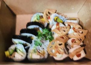 Golden head roll on the right, I forget the one on the left  at Chikyū Vegan Sushi Bar & Izakaya in Las Vegas