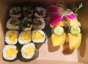 Mango nigiri on right, daikon roll on left  at Chikyū Vegan Sushi Bar & Izakaya in Las Vegas