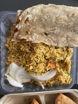 Veggie Biryani + garlic naan  at Taste of India in Rockaway Beach