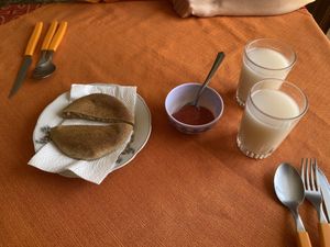 Bread, spicy sauce and chia-based drink  at Snack Vegetariano Dona Franca in Sucre