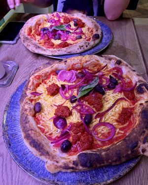 Vegan Nduja with pickled red onions and olives  at Tazzi Pizza in Hamburg