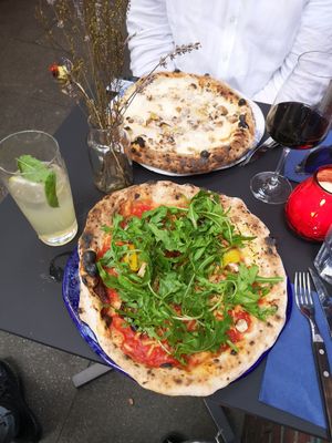 Vegan one with grilled veggies, vegan cheese and fresh arugula at Tazzi Pizza in Hamburg