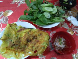 Banh xeo and herb and the dipping sauce at Co Ba in Long Xuyen