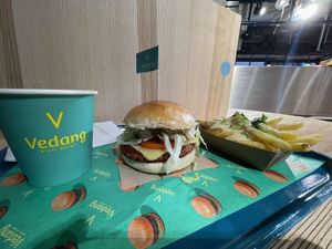 Apfelschorle, Cheesy Burger & Cheesy Fries  at Vedang - green burger | Bikini in Berlin
