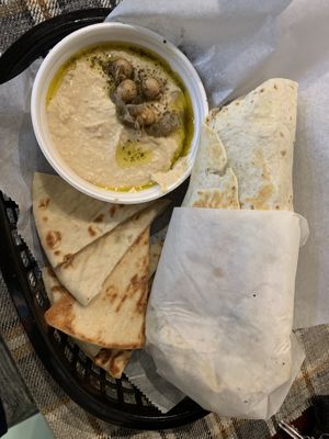 Falafel with vegan sauce and a side of pita bread and hummus  at Café Ostro in Dalton