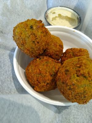 Average falafels with their dairy sauce I threw away at Café Ostro in Dalton