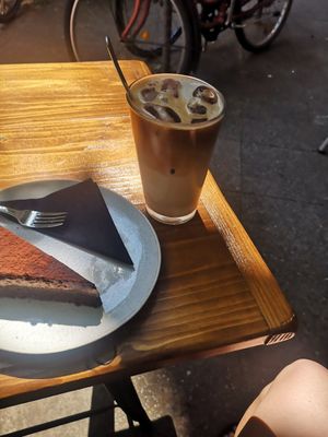 Big iced coffee and vegan Tiramisu cake at Fendricks in Berlin