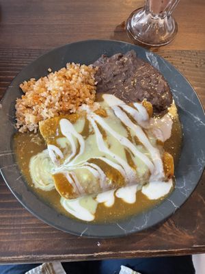 Enchiladas filled with mashed potatoes, rice and beans  at Sol de Maple in Cozumel