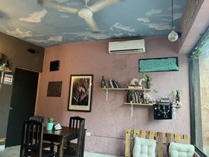 I love the partly cloudy sky painted on the ceiling  at Sol de Maple in Cozumel