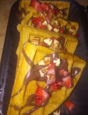 Coconut milk chocolate waffles with strawberry AND nuts at Sol de Maple in Cozumel