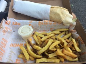 Falafel sandwich with chips and tahini sauce at Les Délices du Liban in Montpellier