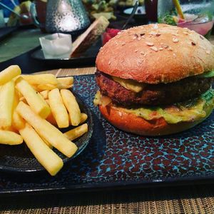 Vegan burger w/fries special request chef Alessandro  at The Creek Bistro Chic in Tunis
