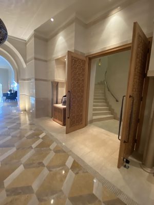 Entrance + lift and stairs at The Creek Bistro Chic in Tunis