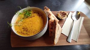 Carrot 🥕 soup with bread and hummus. Delicious. at Mama  in Reykjavik