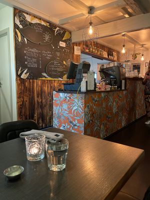 A beautiful vibe down here, lovely upstairs seating with cushions and tables and a darker atmosphere at Mama  in Reykjavik