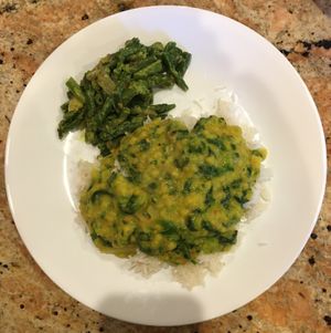 Dhal Spinach & Curry (vegan as is). Cooked in coconut milk. Only 1/3 is on the plate! Sooo good. One of my favorites. Side of green beans. at House of Curry in Rosemount