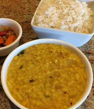 Dhal Curry (Lentils). Cooked in coconut milk. Vegan as is. So good. at House of Curry in Rosemount