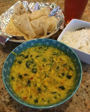 Dhal and Spinach Curry with Godhamba Roti. My go-to entrée. at House of Curry in Rosemount