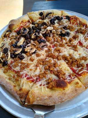 Vegan cheese and vegan sausage at McClain's Pizzeria in Mandeville