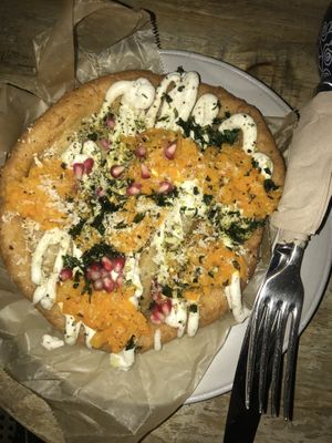 “langoš” with pumpkin, mayo, pomegranate, pumpkin seeds, parsley and shredded chestnut at Brixton House in Bratislava