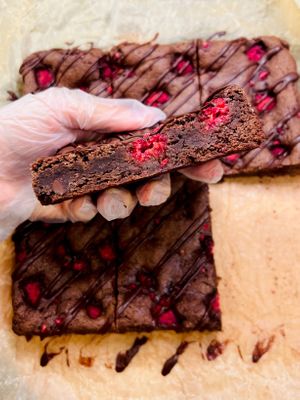 Gluten free fudge brownies with raspberries at Kindness Batters Vegan Bakery in Lake Worth