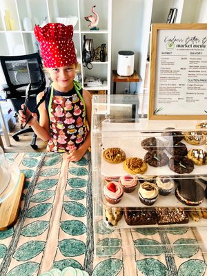 Market event with a little helper  at Kindness Batters Vegan Bakery in Lake Worth