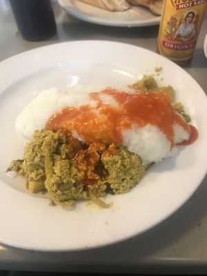 Tofu scramble topped with grits and hot sauce (I forgot to take a photo before I doctored the meal lol) at 821 Cafe in Richmond