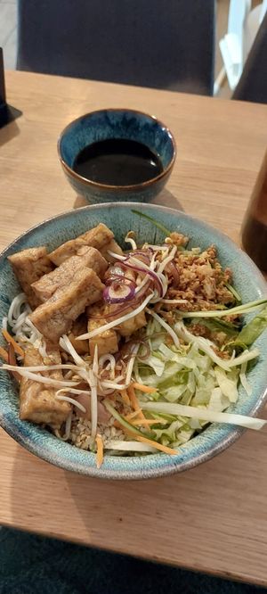 Bun chay with tofu cost 180 Kč. 750 ml water cost 30 Kč. Still yummy 😋 at Ca Phe District in Olomouc