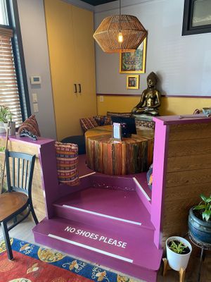 Indoor seating area at Nirvana Tea House & Cafe in Millis