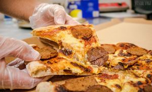 Whats makes our vegan pizza the best in the city? Sourdough crust, homemade seitan pepperoni and Italian sausage, rustic tomato sauce and cashew mozzarella.  at Haverhill Vegan Bakery in Lake Park