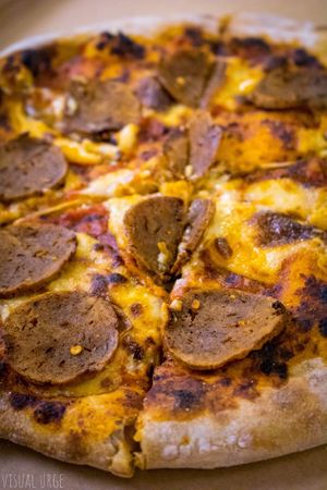 Italian sausage pizza. at Haverhill Vegan Bakery in Lake Park