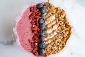 Smoothie Bowl. This is the Berry blast bowl filled with 3 different berries and topped with superfoods such as golgi berry, blueberries, coconut shavings etc. at Antiox in Hagerstown