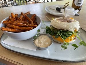Sausage sandy and yam fries  at The Cider House in Vancouver