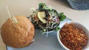 House burger with caesar salad at The Cider House in Vancouver