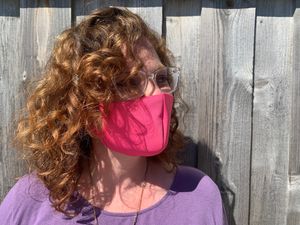 Strawberry blonde balayage and naturally curly cut 💇🏼‍♀️ at Jenny K's Hair Studio in Highland Park