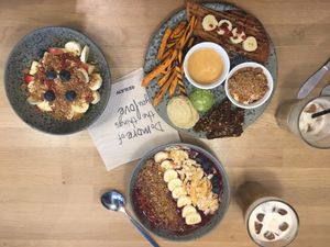 Brunch platter, açai bowls and granola bowl at 42°Raw in Copenhagen