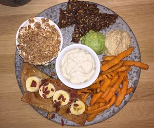 Brunch with granola, fries, pancake etc at 42°Raw in Copenhagen