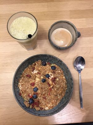 Granola, coffee and juice at 42°Raw in Copenhagen