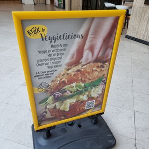 Front sign for 'veggie' /vega options (not vegan) at Panos in Brussels