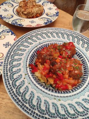 Albóndigas en salsa de pisto con patatas panadera  at La Odisea in Malaga