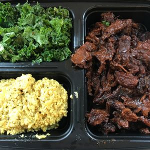 Combo box - tofu scramble, kale salad and BBQ pork  at Terri in New York City