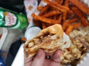 Chicken quesadilla with dipping sauce. Yum!  at Organic Food Kings in Miami