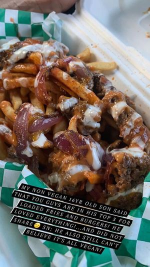 All vegan fully loaded fries!! Vegan patty, vegan cheez , vegan bacon, grilled onions, buffalo and vegan ranch! at Organic Food Kings in Miami