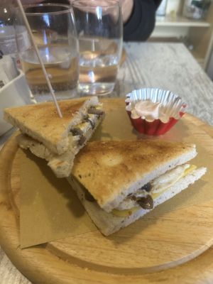 Toast vegano con funghi, formaggio, tofu   at Oasis Cafè in Treviso