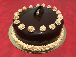 Chocolate base and salted butter caramel filling cake at Contribution in Louvain-la-neuve