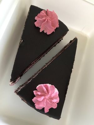 Chocolate base and red fruits filling. at Contribution in Louvain-la-neuve